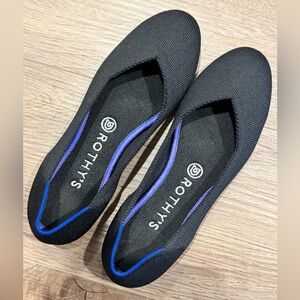 Rothy's Black Slip-On Loafers with Blue Trim